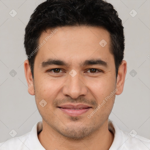 Joyful white young-adult male with short  black hair and brown eyes