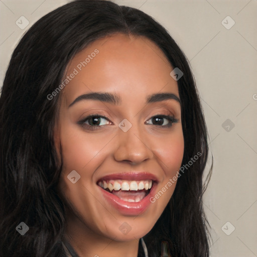 Joyful latino young-adult female with long  black hair and brown eyes