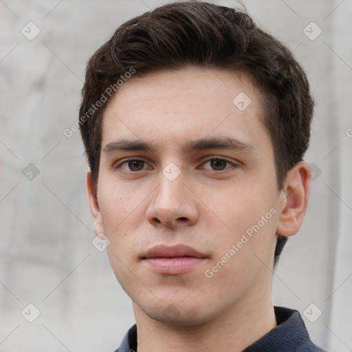 Neutral white young-adult male with short  brown hair and grey eyes