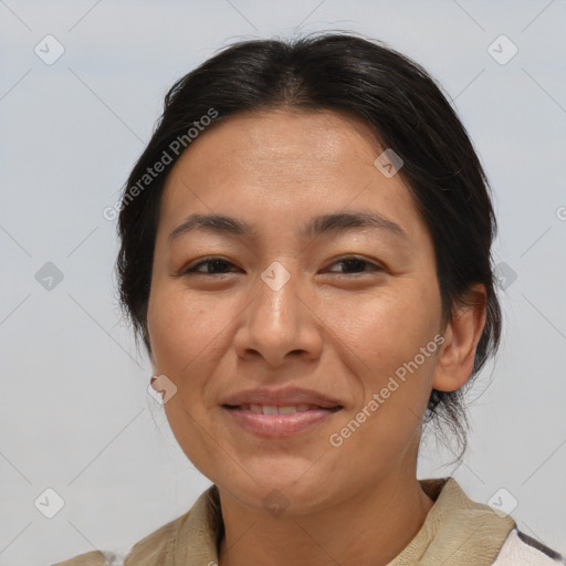 Joyful white adult female with medium  brown hair and brown eyes