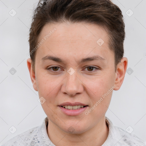 Joyful white young-adult female with short  brown hair and grey eyes