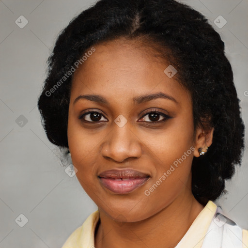 Joyful black young-adult female with medium  black hair and brown eyes