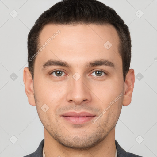 Joyful white young-adult male with short  brown hair and brown eyes