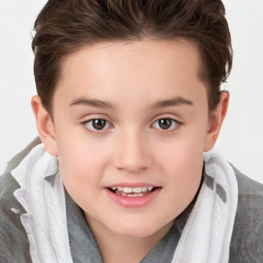 Joyful white child female with short  brown hair and brown eyes