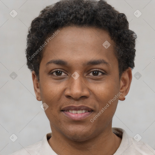 Joyful latino young-adult male with short  brown hair and brown eyes