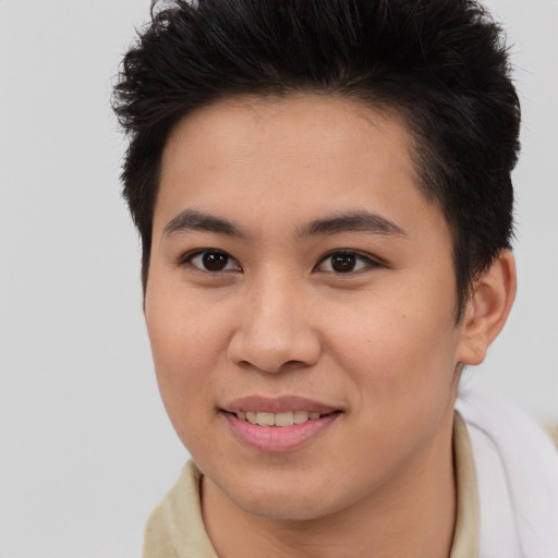 Joyful asian young-adult female with short  brown hair and brown eyes