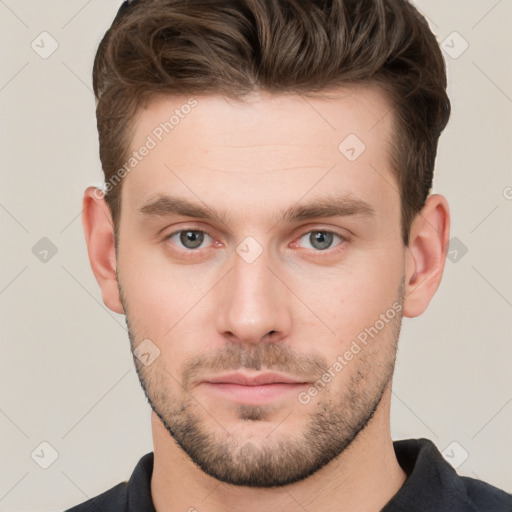 Neutral white young-adult male with short  brown hair and grey eyes