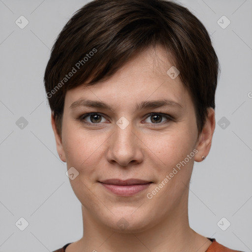 Joyful white young-adult female with short  brown hair and grey eyes