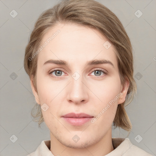 Neutral white young-adult female with medium  brown hair and green eyes