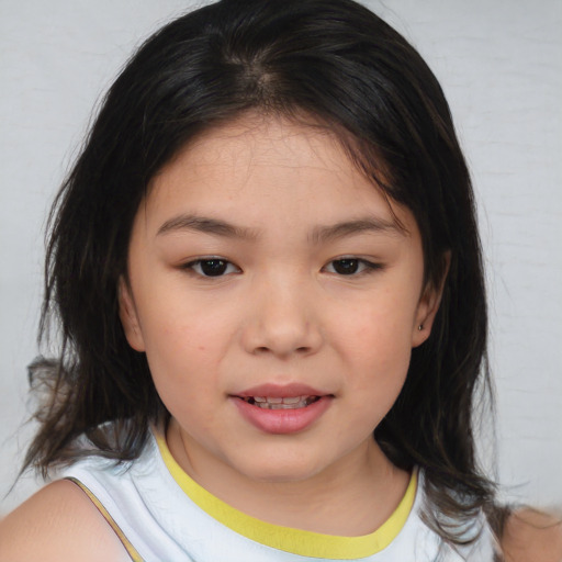 Joyful asian child female with medium  brown hair and brown eyes