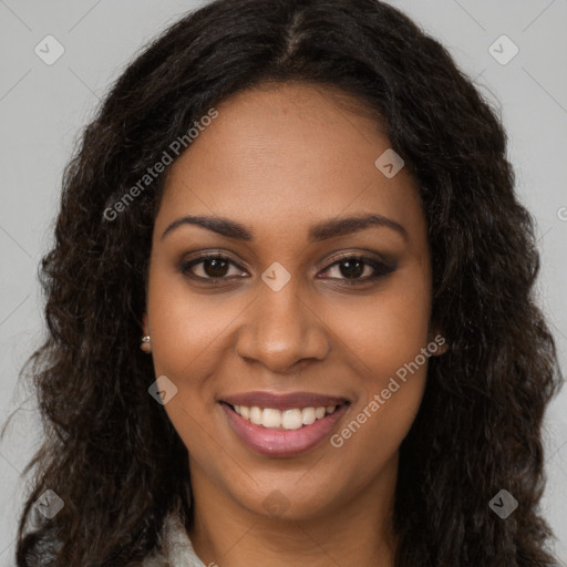 Joyful black young-adult female with long  brown hair and brown eyes