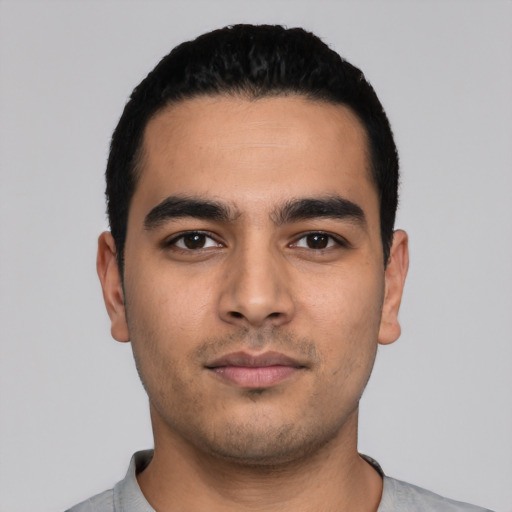 Neutral latino young-adult male with short  black hair and brown eyes