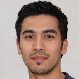 Neutral asian young-adult male with short  black hair and brown eyes