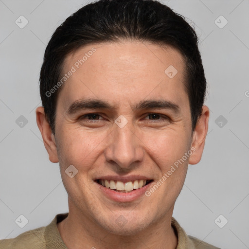 Joyful white adult male with short  brown hair and brown eyes