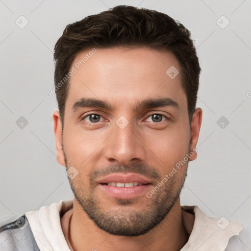 Joyful white young-adult male with short  brown hair and brown eyes