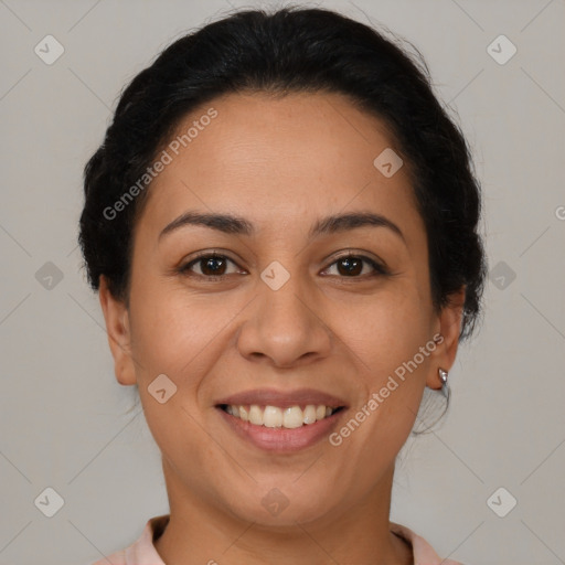 Joyful latino young-adult female with short  brown hair and brown eyes