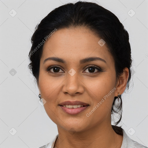 Joyful latino young-adult female with medium  black hair and brown eyes