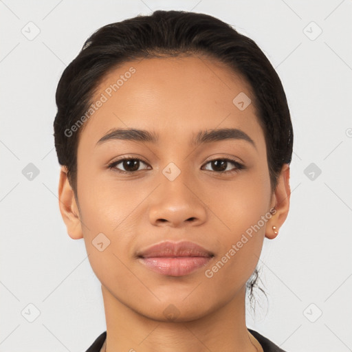 Joyful latino young-adult female with short  black hair and brown eyes