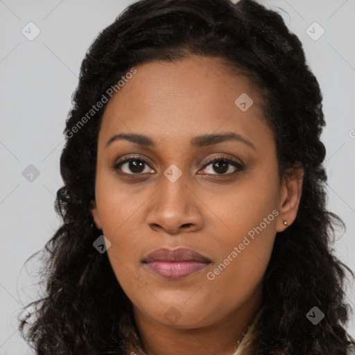 Joyful black young-adult female with long  brown hair and brown eyes