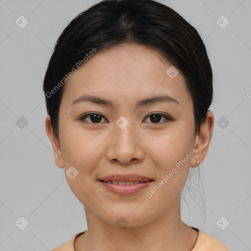 Joyful white young-adult female with short  brown hair and brown eyes