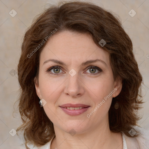 Joyful white young-adult female with medium  brown hair and green eyes