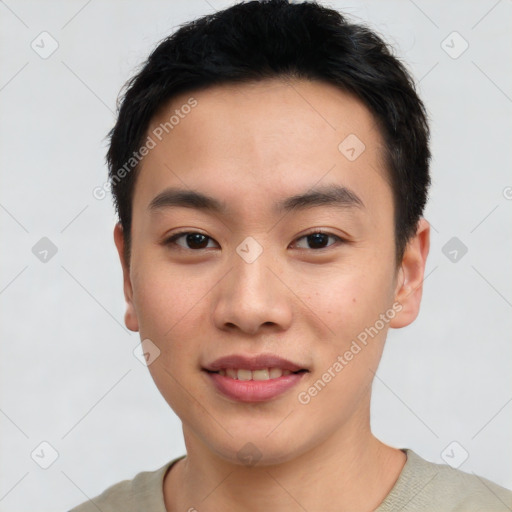 Joyful asian young-adult male with short  black hair and brown eyes