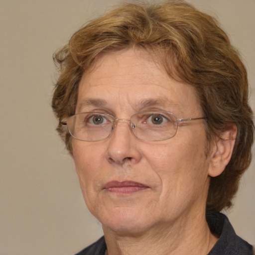 Joyful white middle-aged female with medium  brown hair and brown eyes