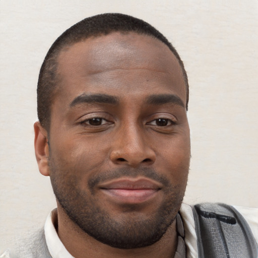 Neutral black young-adult male with short  brown hair and brown eyes