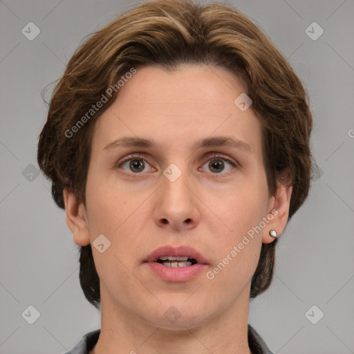 Joyful white adult female with short  brown hair and grey eyes