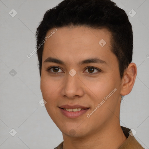 Joyful white young-adult male with short  black hair and brown eyes