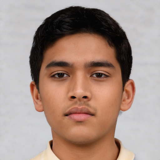 Neutral asian child male with short  black hair and brown eyes