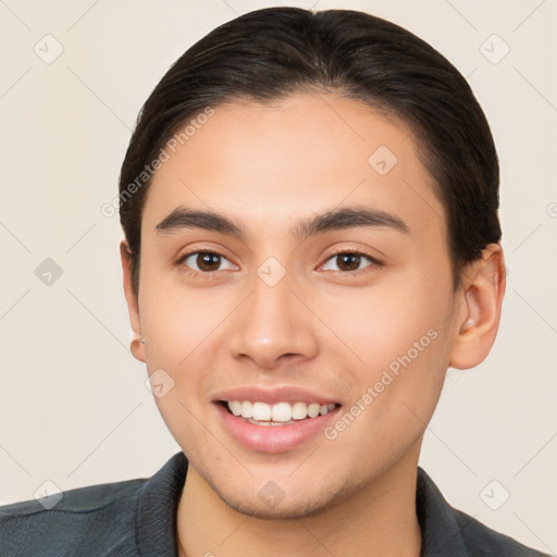 Joyful white young-adult male with short  brown hair and brown eyes