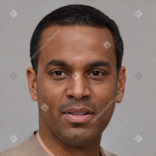 Joyful latino young-adult male with short  brown hair and brown eyes