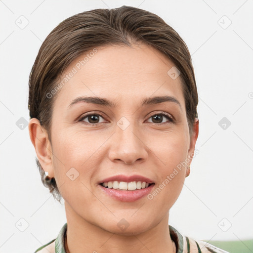 Joyful white young-adult female with short  brown hair and grey eyes