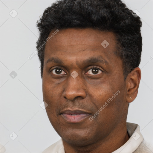Neutral black adult male with short  black hair and brown eyes