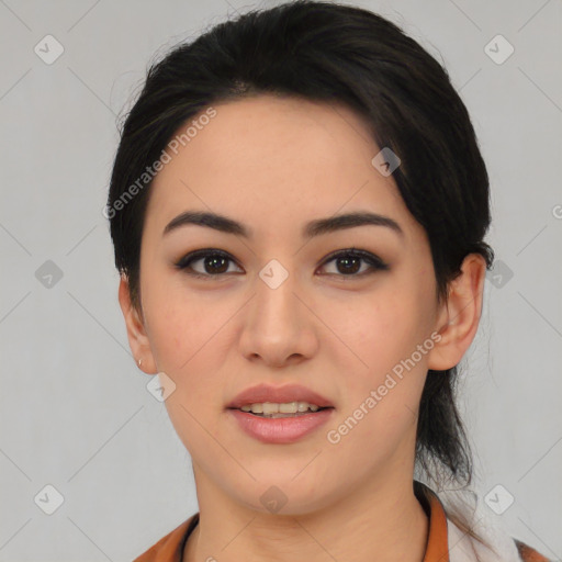 Joyful asian young-adult female with medium  black hair and brown eyes