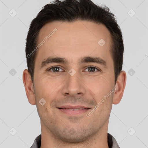 Joyful white young-adult male with short  brown hair and brown eyes