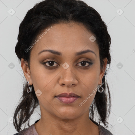 Joyful latino young-adult female with long  brown hair and brown eyes