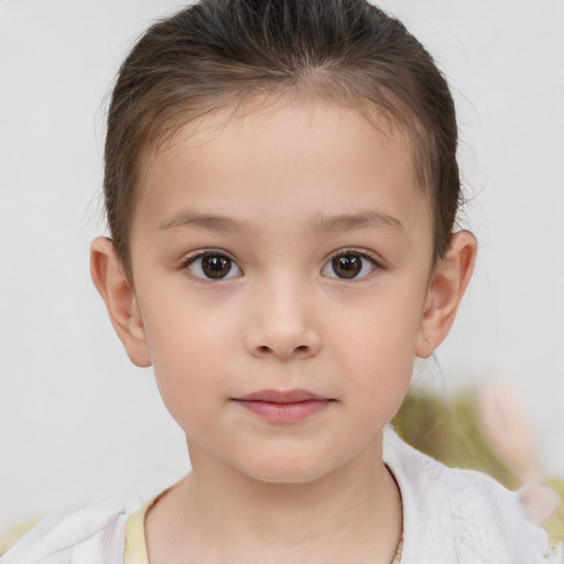 Neutral white child female with short  brown hair and brown eyes