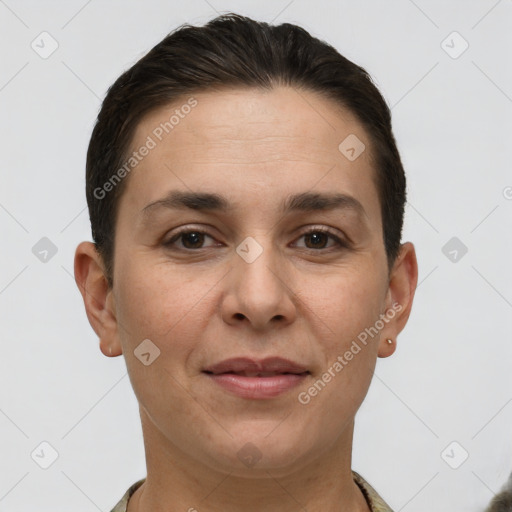 Joyful white adult female with short  brown hair and brown eyes