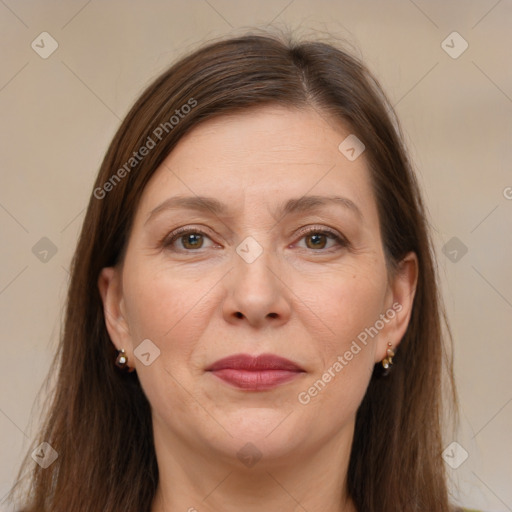 Joyful white adult female with medium  brown hair and brown eyes