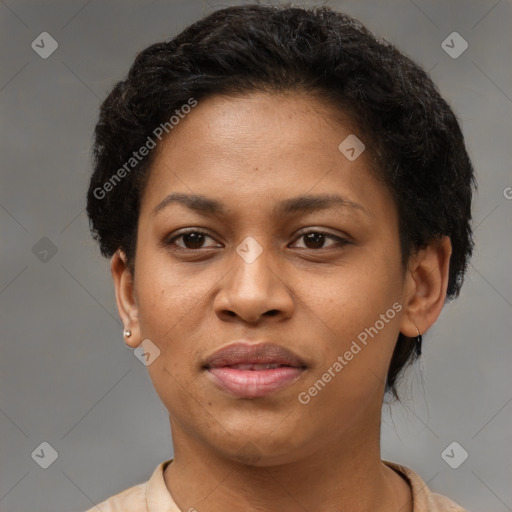 Joyful black young-adult female with short  brown hair and brown eyes