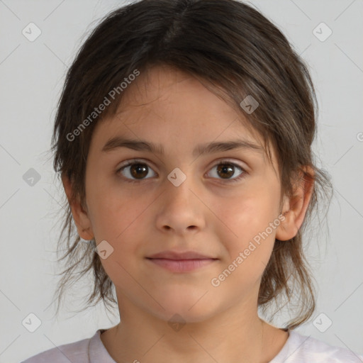 Joyful white child female with medium  brown hair and brown eyes