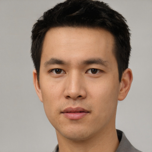 Neutral asian young-adult male with short  black hair and brown eyes