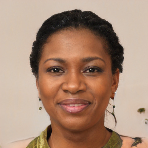 Joyful black young-adult female with medium  black hair and brown eyes