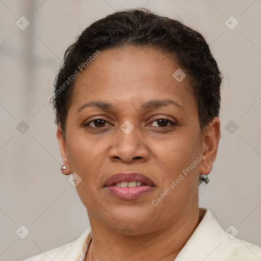 Joyful latino adult female with short  brown hair and brown eyes