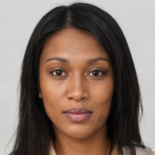 Neutral black young-adult female with long  black hair and brown eyes