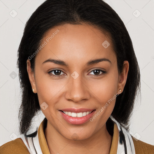 Joyful latino young-adult female with long  brown hair and brown eyes