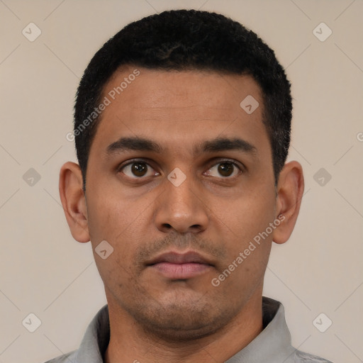 Neutral latino young-adult male with short  black hair and brown eyes