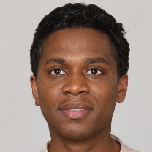 Neutral black young-adult male with short  black hair and brown eyes